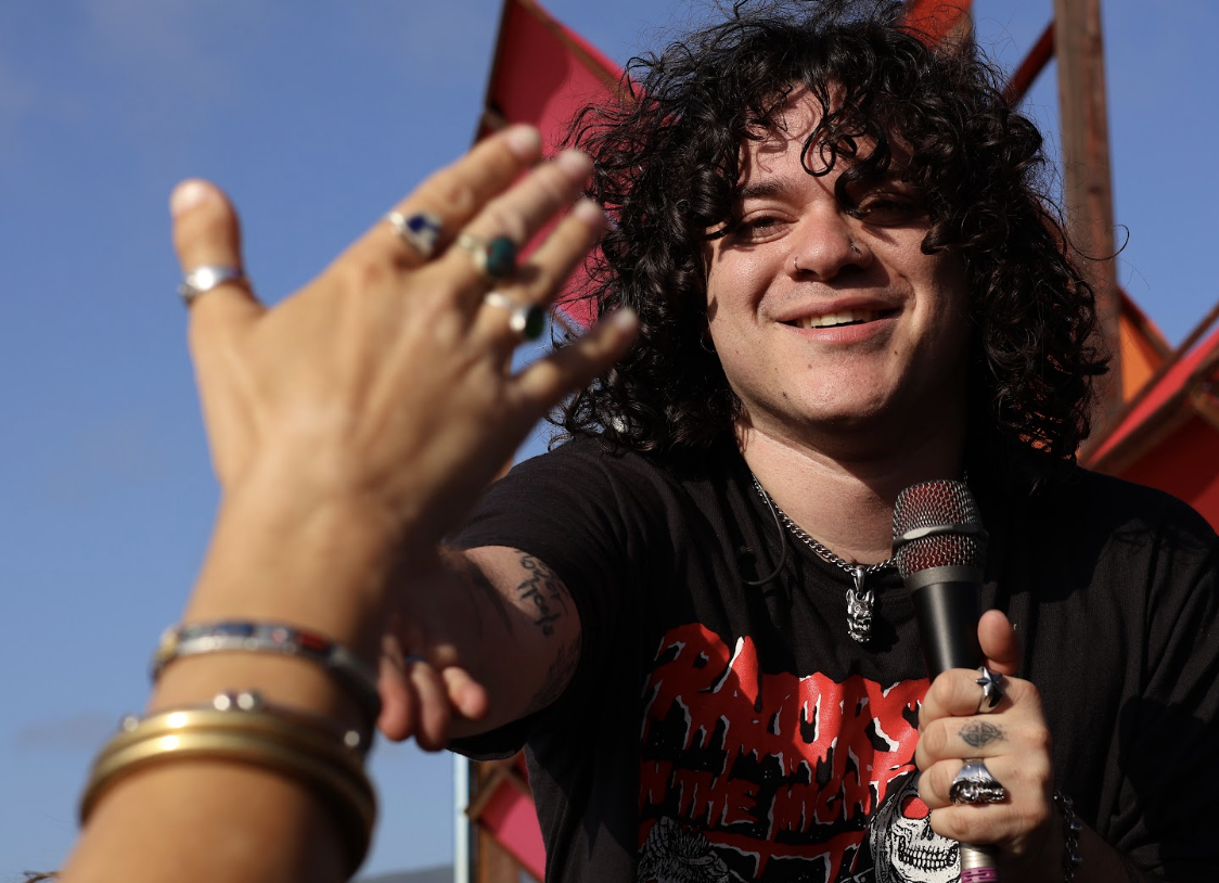 Mind’s Eye lead singer Vince Lopez interacting with audience members at the barricade at Shabang Music Festival on May 2. 
